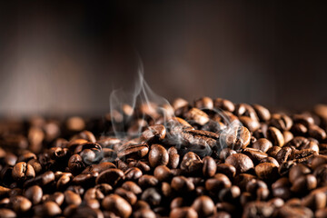 bunch of steamed coffee beans on brown background
