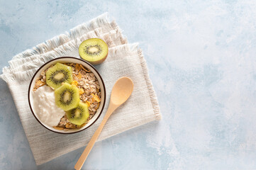 Granola bowl with mango and yogurt, copy space