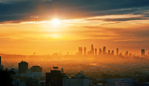 City of Los Angeles skyline at sunrise, scenic cityscape view from Hollywood Hills.