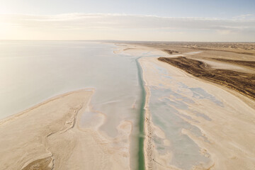 Salt lake with wide flatlands background.