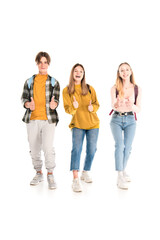 Naklejka premium Cheerful teenagers with backpacks showing thumbs up on white background