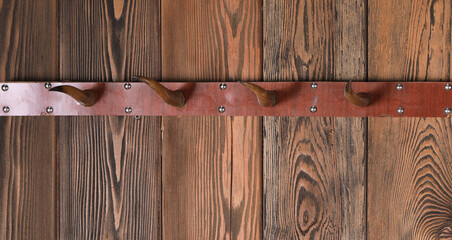 vintage wooden hanger on a wooden wall