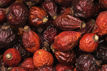 Background of dry rose hips, close-up