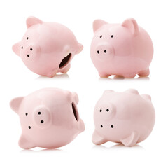 Set of pink ceramic piggy banks isolated on white background
