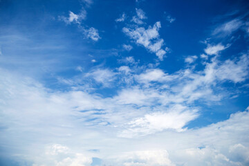 Fluffy white clouds on a beautiful blue sky