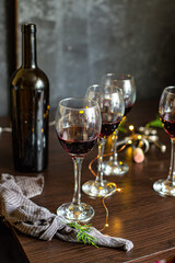 red wine in a glass festive christmas holidays party new year meal on the table tasty serving size top view copy space for text food background rustic