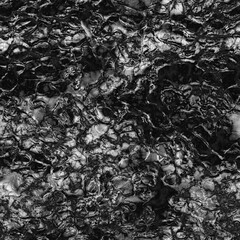 A seamless abstract texture like rough alien skin.