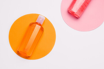 Citrus shower gel on a white background. Copy space