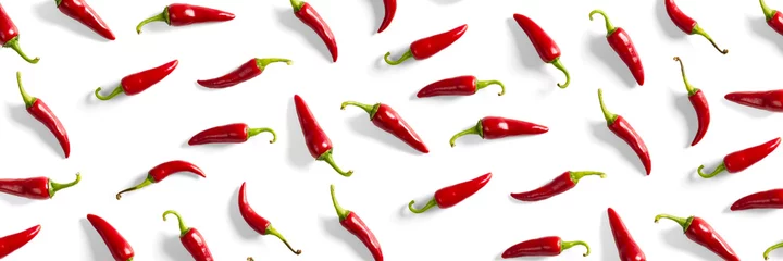 Poster Hot chili peppers Creative background made of red chili or chilli on white backdrop. Minimal food backgroud. Red hot chilli peppers background.