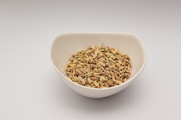 Fennel seeds on white background