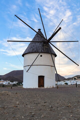Fototapeta na wymiar In Almeria approaching a mill in the town of the well of the friars in the Mediterranean Sea, in Cabo de Gata, in Spain.