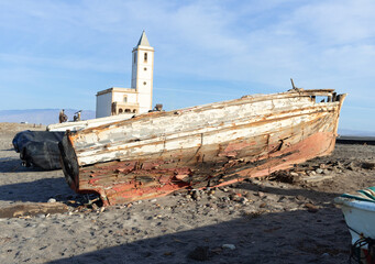 Beautiful old ship, in the salt flats of Almeria in the Mediterranean Sea, in Cabo de Gata, in Spain.