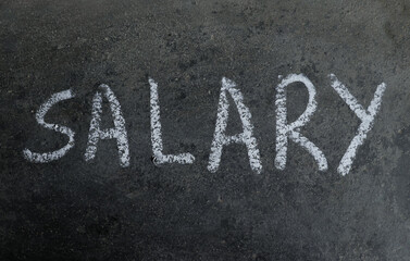 Fototapeta premium Salary Word Written on Blackboard