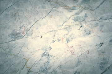 The walls are made of marble and have wires.