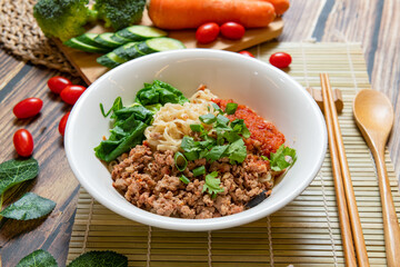 Yunnan-Style Noodle with Pork, This tangle of cold noodles and vegetables in a sweet, sour, and savory sauce.