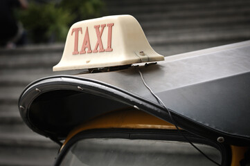 Thai taxi car. TukTuk is three wheel.
