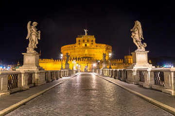 Fototapeta na wymiar Rome by night - Sant'angelo Castle bridge