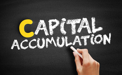 Capital accumulation text on blackboard, concept background