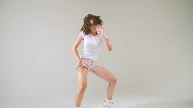 girl dancing on a white background