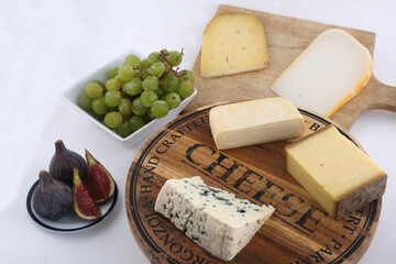 cheese board with figs and grapes