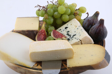 cheese board with figs and grapes