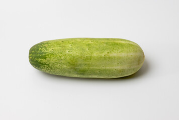 Fresh single green cucumbers isolated on white background