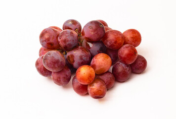 Red delicious bunch of grapes on white background