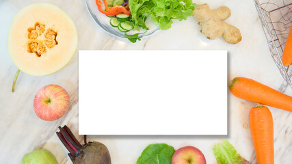 various fruits and vegetables with white paper card. Flat lay. Healthy eating concept.