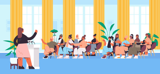group of mix race female friends discussing during meeting in women's club girls supporting each other union of feminists concept lecture hall interior horizontal full length vector illustration