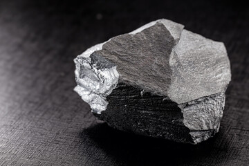 iron ore stones, on isolated black background, used in industry, iron ore for export and import.