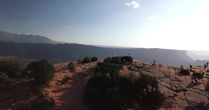 Off-roading Vehicles on a Beautiful Desert mountain cliff ledge
