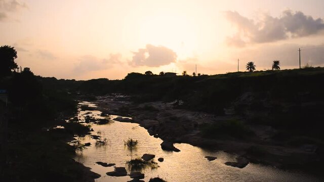 Scenic view of beautiful sunset at river. at Khari river in bhuj, Kutch, India.