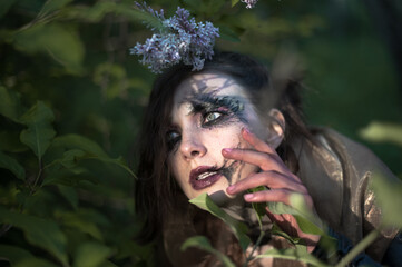 Close-up female portrait with professional makeup. Art project