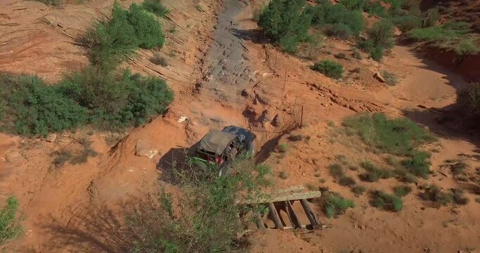 Off-roading Vehicle Driving in on Beautiful Desert trail