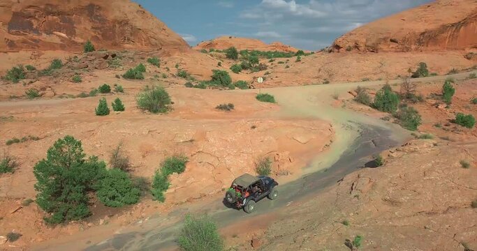 Off-roading Vehicle Driving in on Beautiful Desert trail