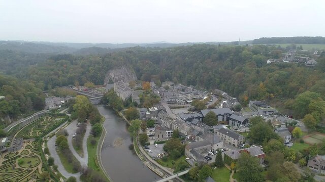 Beautiful Townscape Surrounded By Lush Green Plants And Trees In Durbuy, Luxembourg, Belgium - Aerial Drone Shot