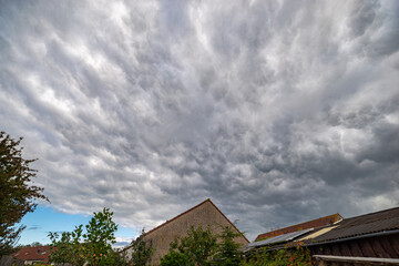 Threatening sky when a thundercloud passes over a city
