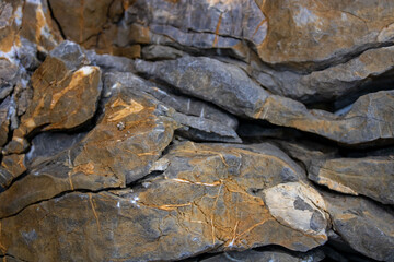 Textured rock. Layers of stones. Close-up