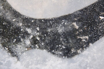 Beautiful ice pattern on a frozen ditch	

