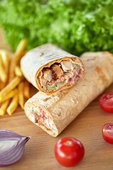 Classic pork shawarma in lavash, close-up. 