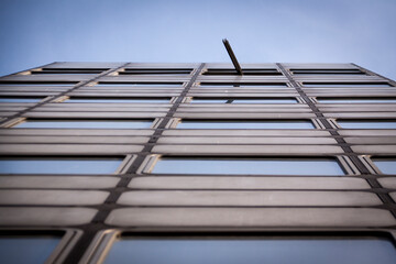 Horizontal Detail Of Facade Of Abandoned Modern Building With One Mysterious Open Window. Looking...