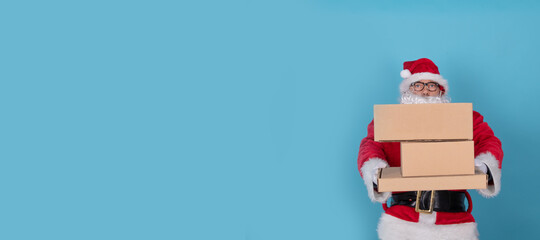 santa claus isolated on background with gift boxes