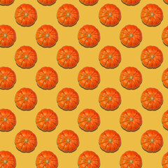 Pattern with repeated pumpkins on a bright yellow background. Top view.