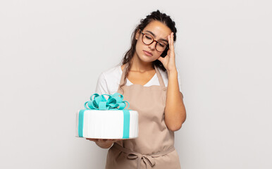 young hispanic woman feeling bored, frustrated and sleepy after a tiresome, dull and tedious task,...