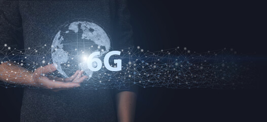 Hand hold planet earth, global network and 6G network connection conc. 6G network wireless systems.
