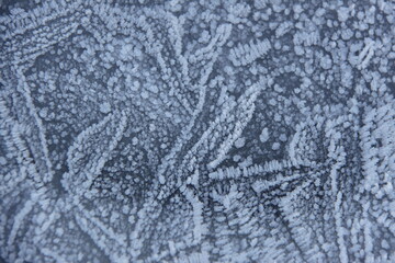 Beautiful ice pattern on a frozen ditch.