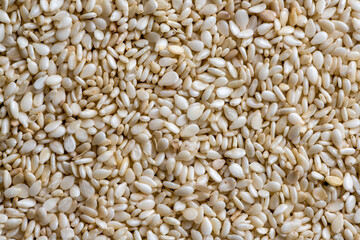 Texture of sesame seeds, top view. Food background.