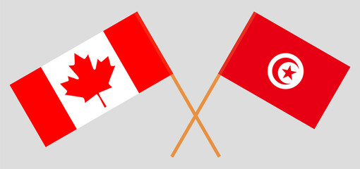 Crossed flags of Tunisia and Canada