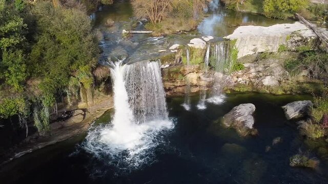 Aerial view of a scenic waterfall in Pedrosa de Tobalina, Burgos, Spain. High quality 4k footage