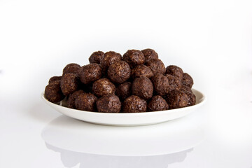 baked chocolate cereal balloons on a plate healthy food